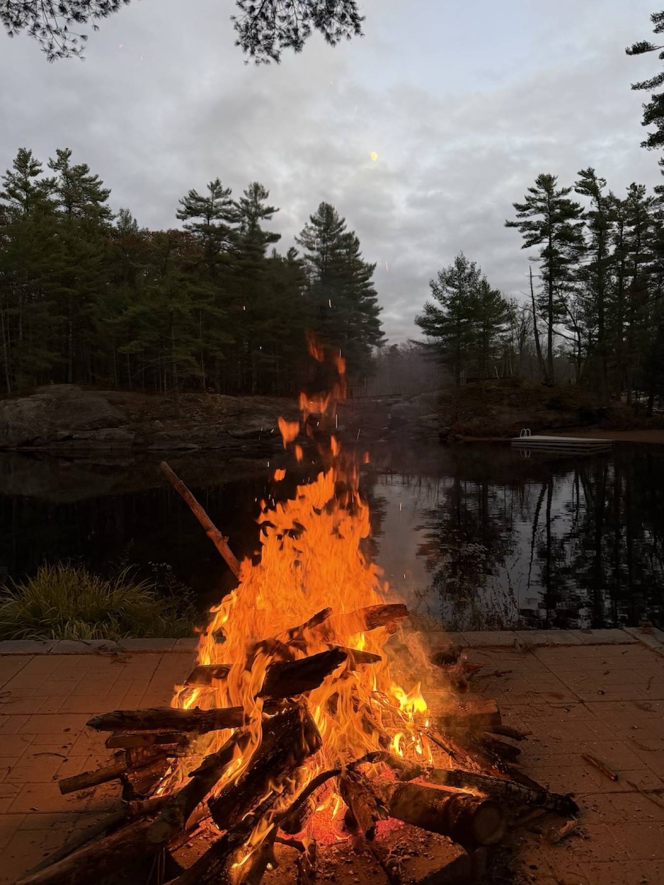Campfire by the lake at Muskoka Falls